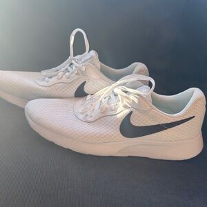 Nike White Athletic Shoes with Black Logo